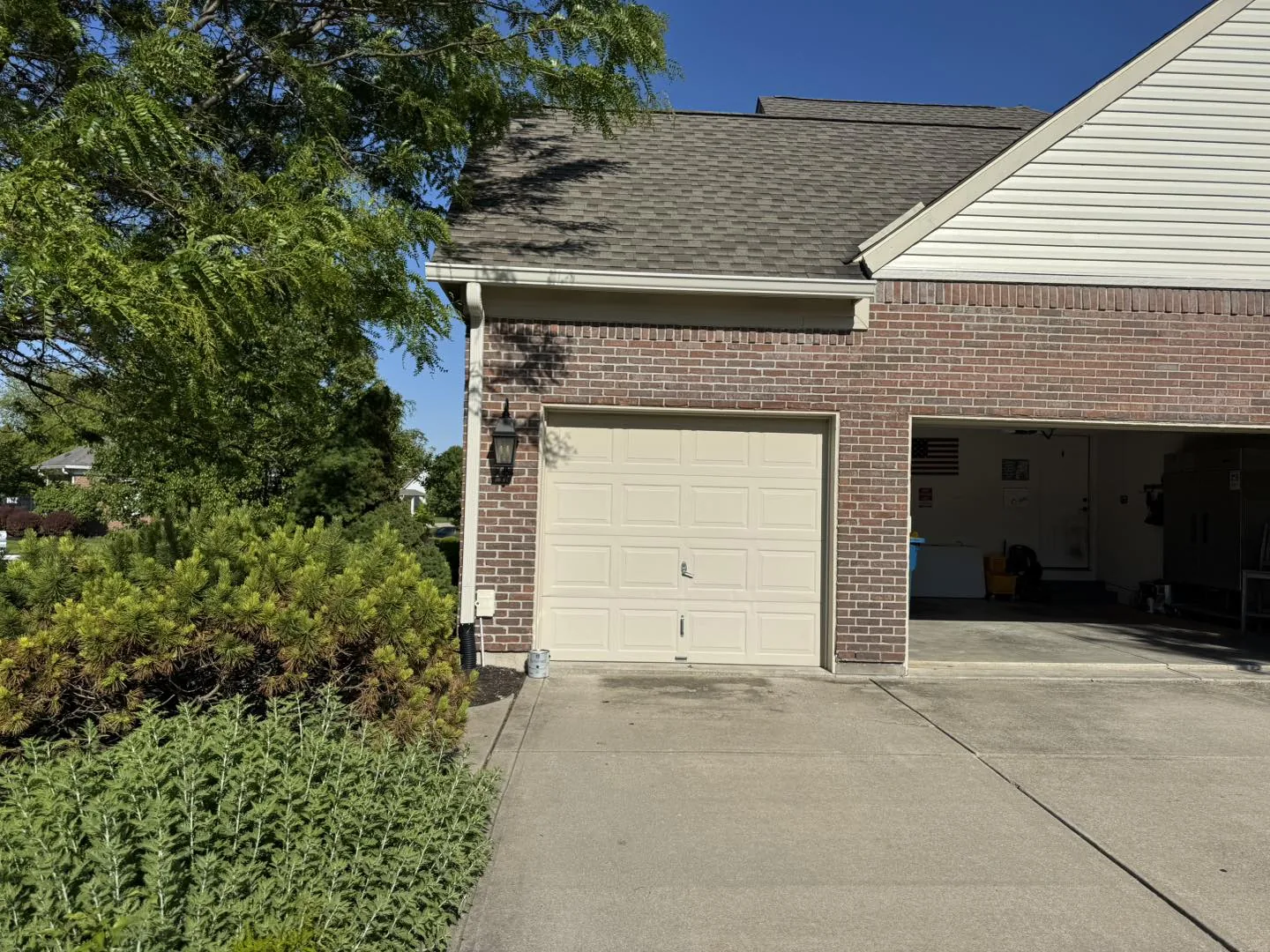 Garage Downspout by Bryant's Seamless Guttering
