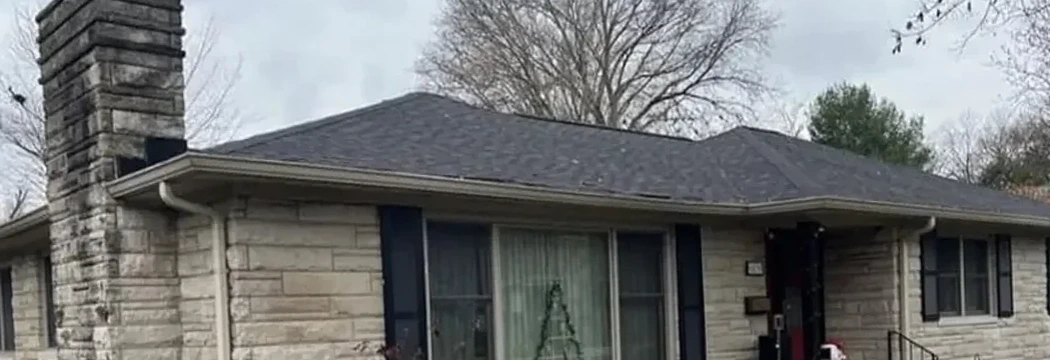 Home before black gutter replacement